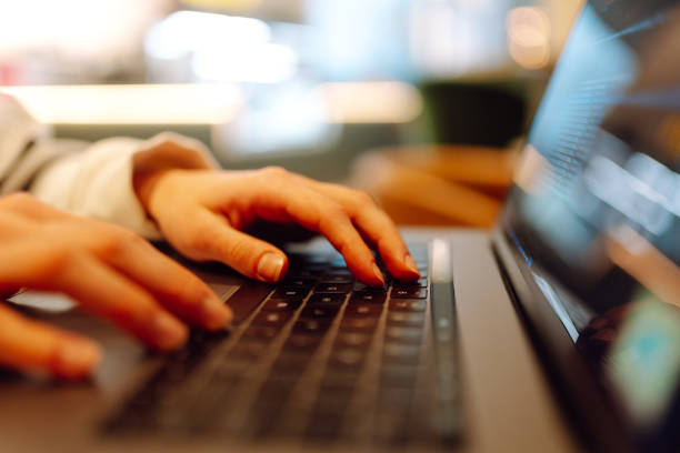 istock Close-up of hands typing laptop. Office work from home. 2178685433