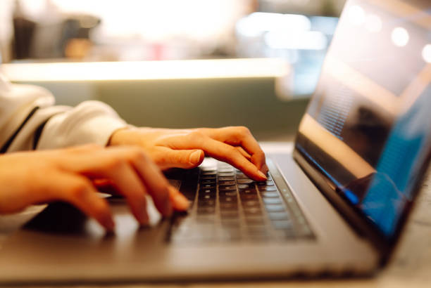 istock Close-up of hands typing laptop. Office work from home. 2178685456