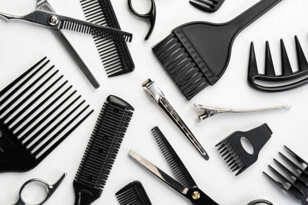 istock Black hairdressing tools and various hairbrushes on white background 2178687686