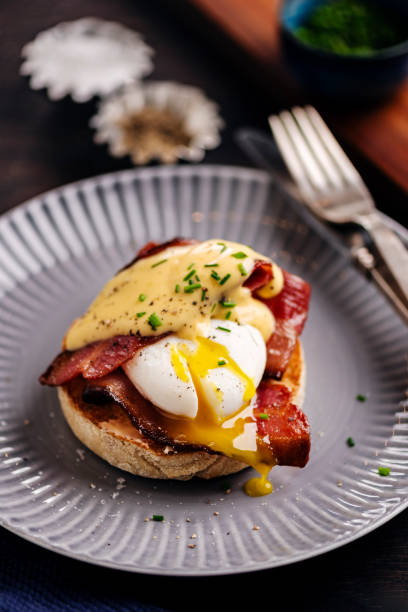 istock English Muffins with Eggs Benedict and Bacon 2178687811