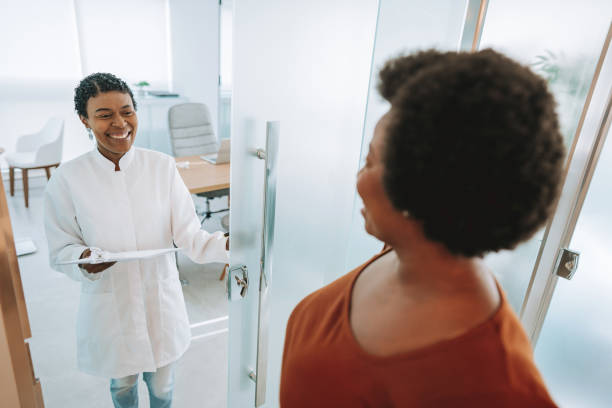 istock Arriving at the doctor's office shake hands 2178688109