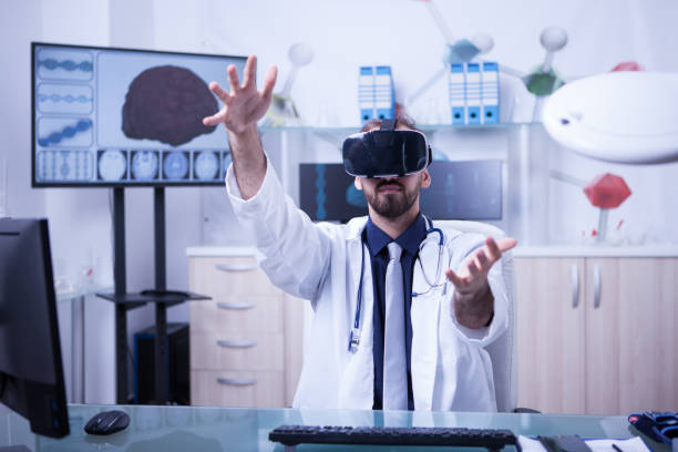 istock View of a male doctor holding a 3d rendering using virtual reality headset 2178688749