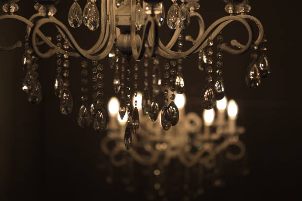 istock A decorative chandelier with numerous crystal beads hanging from it, suitable for use in interior design or commercial settings 2178689833