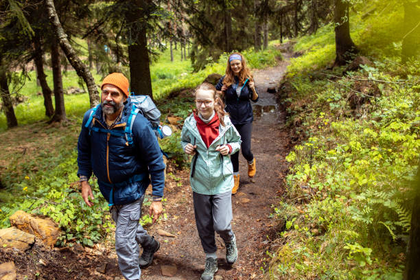 istock Young family hiking in a forest 2178691278