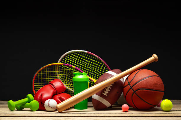 istock Various sports equipment on black background studio shot 2178694419