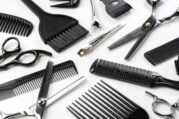istock Black hairdressing tools and various hairbrushes on white background 2178694465
