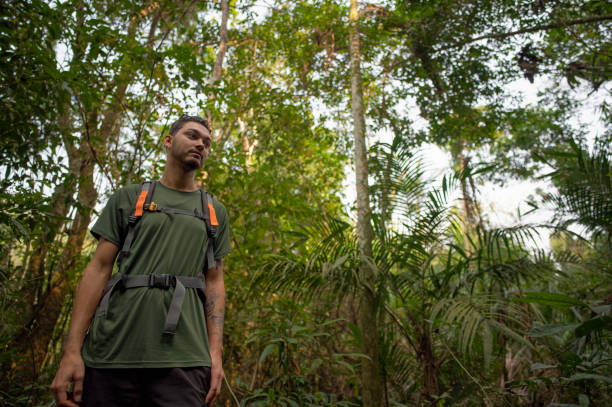 istock Backpacker man in tune and harmony with nature. 2178695567