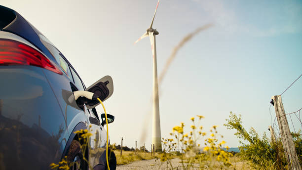 istock Charging Electric Vehicle with Wind Power 2178695647