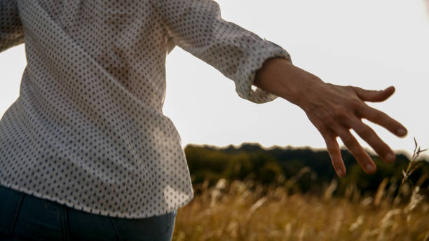 A woman runs through mystical wildflowers