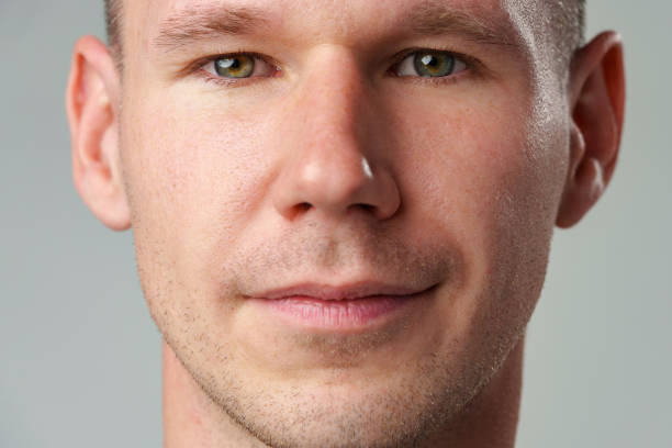 istock Close up shot of a young man face 2178696916