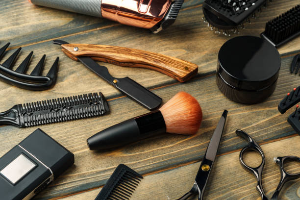 istock Set of professional barber tools on wooden table 2178697010