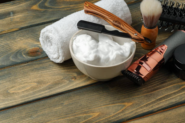 istock Hairdressing barber tools on wooden background close up 2178697503