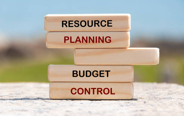istock Resource planning and budget control text on wooden blocks with blurred nature background 2178698348