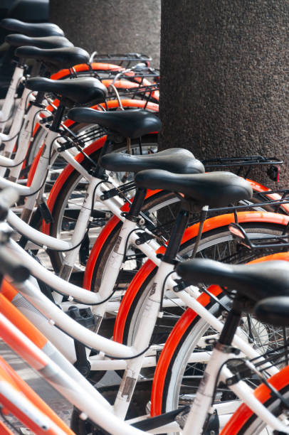 istock Orange-White Bicycles Lined up Neatly 2178701694
