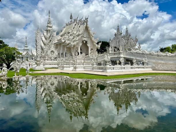 Thailand - Chiang Rai - White Temple or Wat Rong Khun  It is of the most beautiful temples built in this century. A masterpiece famed for his extravagant and unique Buddhism-related paintings, Wat Rong Khun reflects the artist’s grand visions of heaven, hell and Nirvana.