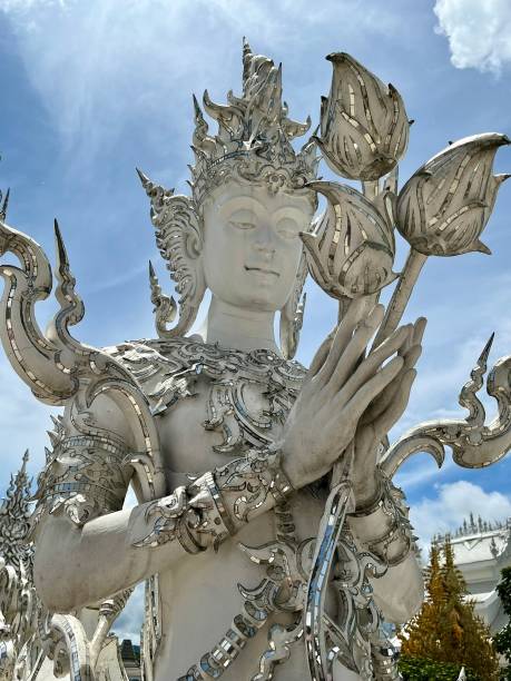 Thailand - Chiang Rai - White Temple or Wat Rong Khun  It is of the most beautiful temples built in this century. A masterpiece famed for his extravagant and unique Buddhism-related paintings, Wat Rong Khun reflects the artist’s grand visions of heaven, hell and Nirvana.