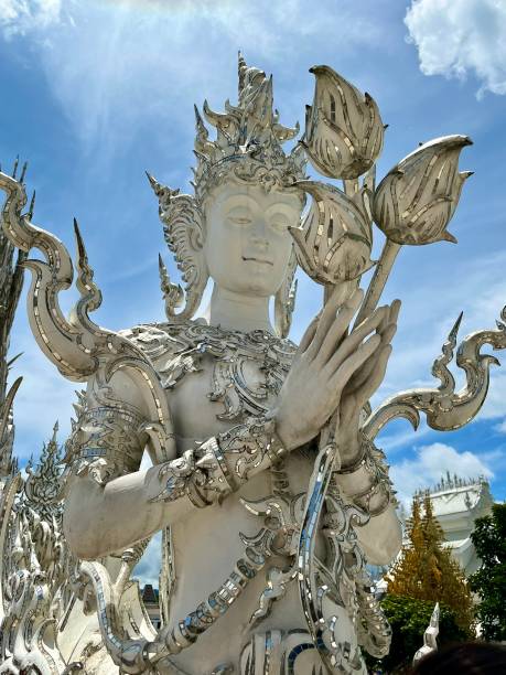 Thailand - Chiang Rai - White Temple or Wat Rong Khun  It is of the most beautiful temples built in this century. A masterpiece famed for his extravagant and unique Buddhism-related paintings, Wat Rong Khun reflects the artist’s grand visions of heaven, hell and Nirvana.