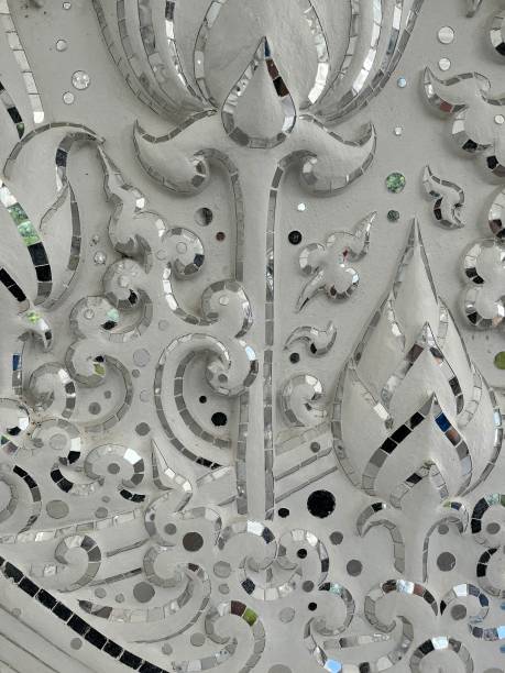 Thailand - Chiang Rai - White Temple or Wat Rong Khun  It is of the most beautiful temples built in this century. A masterpiece famed for his extravagant and unique Buddhism-related paintings, Wat Rong Khun reflects the artist’s grand visions of heaven, hell and Nirvana.