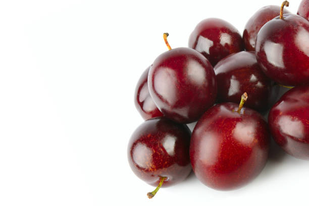 istock Fresh plums isolated on white. Free space for text. 2178704746