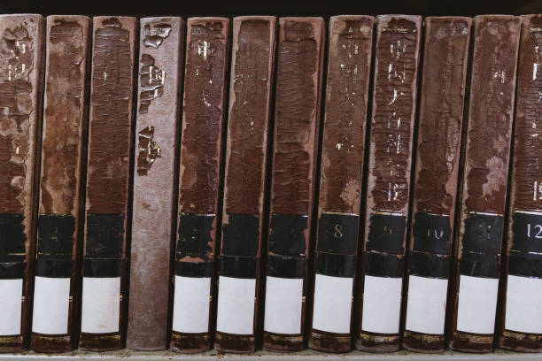 istock Row of Old Worn-Out Books with Brown Covers 2178705705