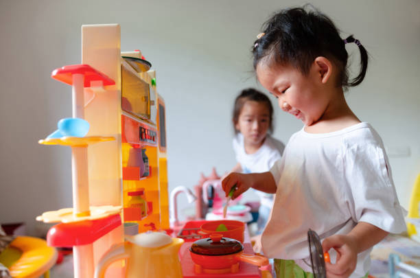 istock A child is cooking in the toy kitchen 2178706979