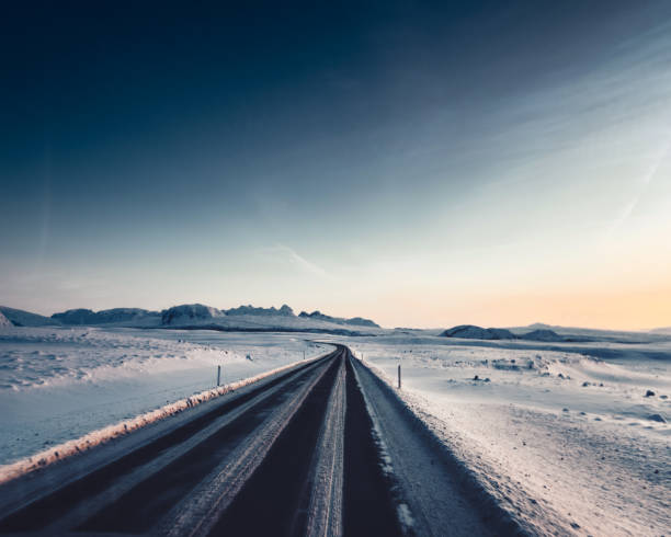 frozen road in iceland at dusk