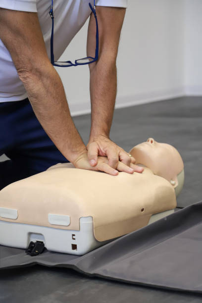 istock first aid course - company safety - cardiac massage - Basic Life Support 2178713589