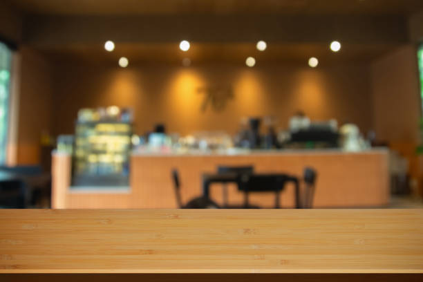 istock Abstract blur interior coffee shop restaurant or cafe and kitchen for background, counter top on of clean abstract home indoor. Warm tone used for display or montage your food dining banner products. 2178715490