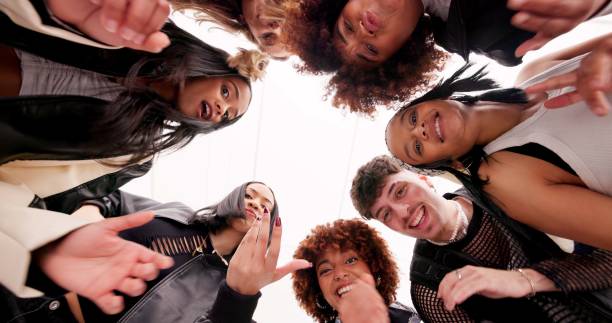 istock Low angle, portrait and group with teamwork, dance and smile with energy, cooperation and culture. Below, face and friends with happiness, bonding together and talent with performance, joy and skills 2178717561