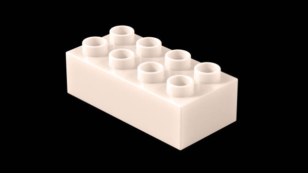 Champagne Pink Plastic Toy Block Isolated on a Black Background.