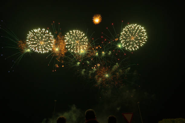 istock Spectators enjoying vibrant fireworks on New Years Eve celebration 2178719243