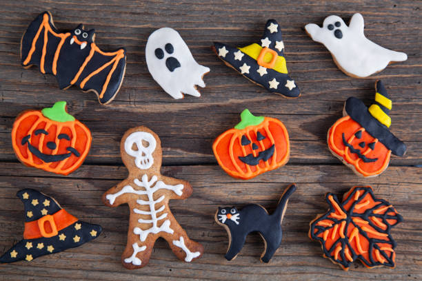 istock Halloween homemade gingerbread cookies on rustic wooden table 2178720043