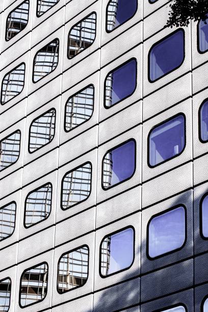 Modern Skyscraper with Reflective Blue Windows in Hong Kong