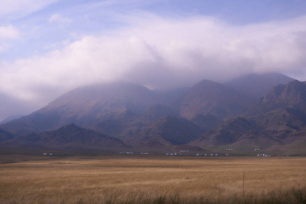 istock Misty Morning over the Prairie and Mountains(Sailimu Lake, Xinjiang, China) 2178724114