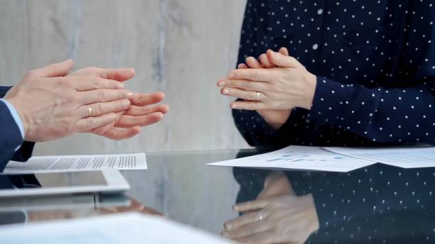 istock Unrecognizable business people shaking hands and clapping over glass table after contract signing in office. Agreement and handshake themes 2178725013
