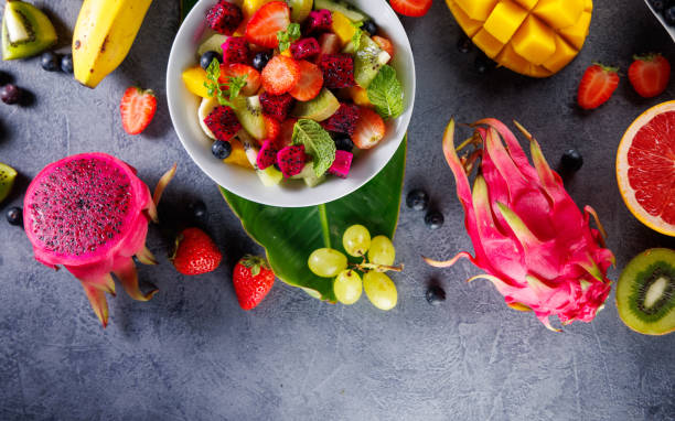 istock fresh fruit salad . Exotic fruits, healthy eating 2178728376