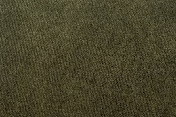 istock Olive green velour texture, soft fabric surface in close-up, seamless textile pattern. 2178731723