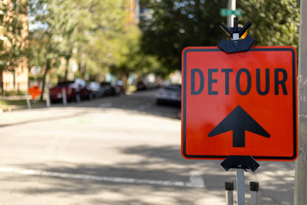 istock A red detour sign with a bold arrow indicating the way 2178731833