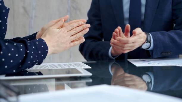 istock Unrecognizable business people shaking hands and clapping over glass table after contract signing in office. Agreement and handshake themes 2178732204