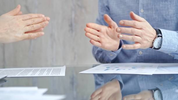 istock Unrecognizable business people clapping over glass table after contract signing in office. Agreement and handshake themes 2178732254