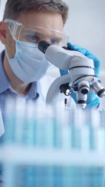 istock Man scientist with protective glasses, mask and gloves is using 2178732864