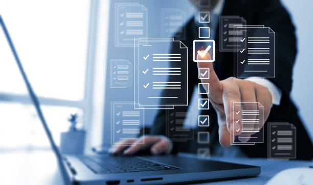 istock Businessman check virtual electronic documents and checklist approve.Business productivity checklist and filling survey form.Fast checklist and clipboard task management. 2178733111