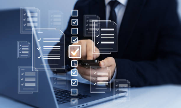 istock Businessman check virtual electronic documents and checklist approve.Business productivity checklist and filling survey form.Fast checklist and clipboard task management. 2178733112