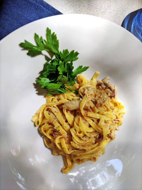 istock Bowl with portion of tagliolini pasta with crab meat sauce 2178734578