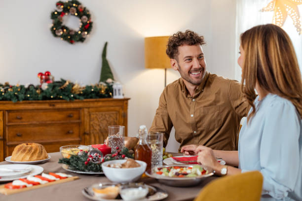 istock A heterosexual couple having a Christmas dinner with warm conversations 2178735291