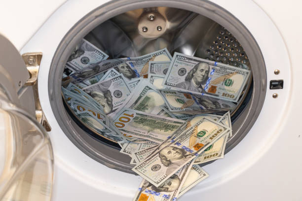 istock US dollar banknotes in washing machine 2178735589