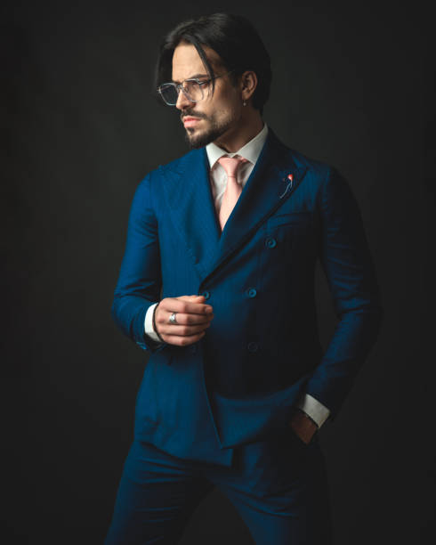 istock confident businessman with glasses looking to side and posing 2178736331