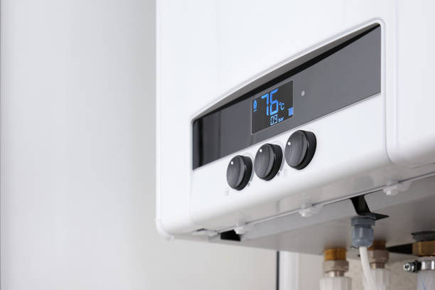 istock Close-up regulators a modern digital gas boiler. Setting the central heating level in a gas boiler. 2178736763