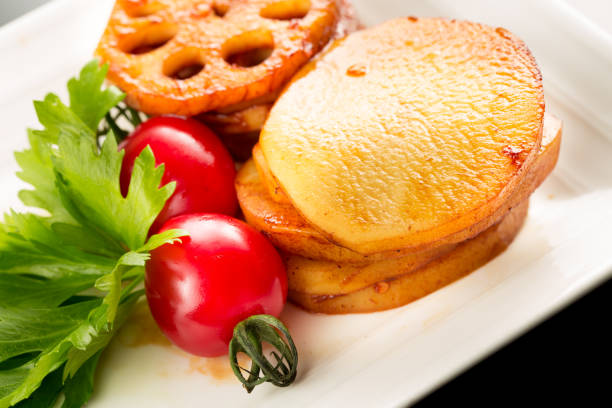 Braised lotus root and potatos, Chinese cuisine.