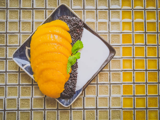 Mango Sticky Rice with black sticky rice, fresh mango and cream